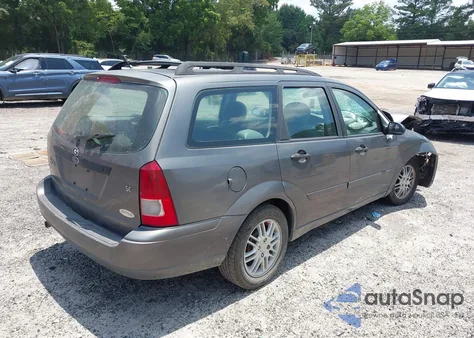 2003 Ford Focus Se/Ztw z USA, uszkodzony, nr VIN 1FAFP36313W334084